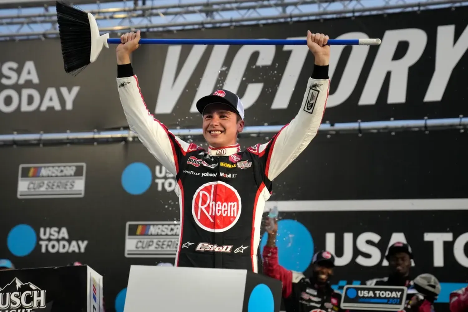 Christopher Bell celebrates his victory at New Hampshire Motor Speedway, marking his third win of the 2024 season.