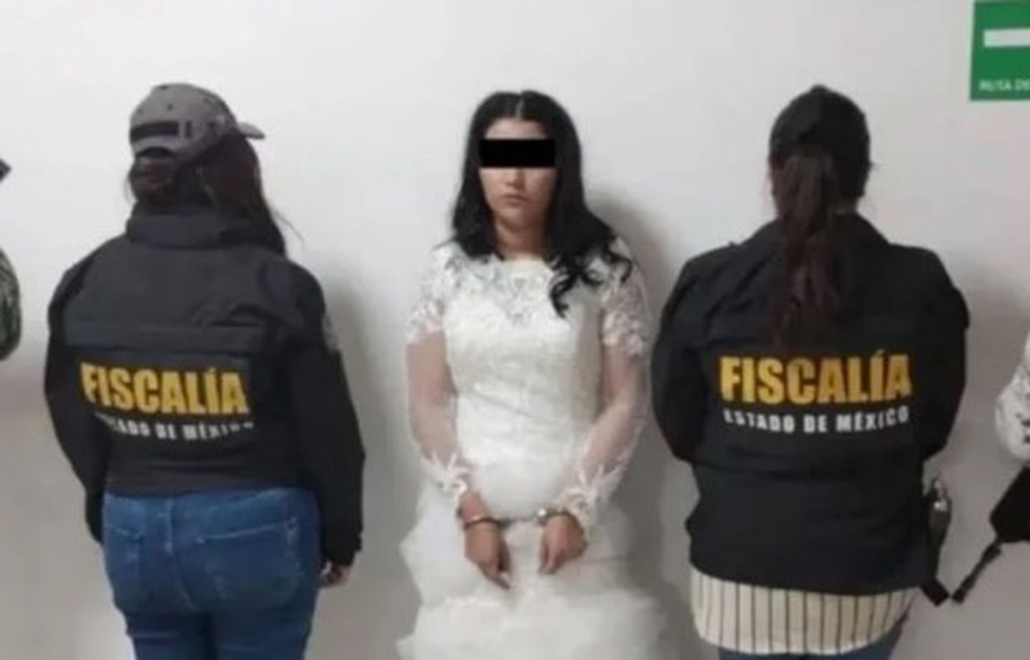 Nancy N, vestida de novia...pero detenida.