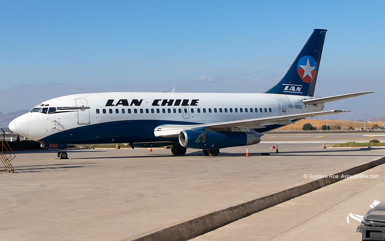 The aircraft, parked near the ENAER hangar, features the LAN Chile logos used during the 1980s.