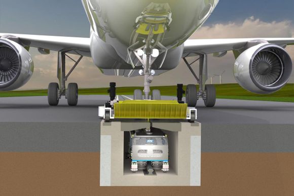 Company proposes aircraft towing system using underground rails