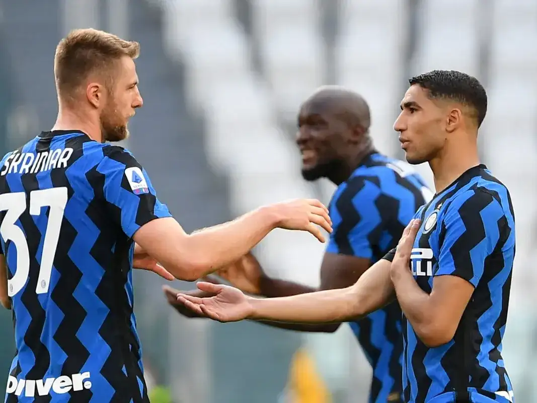 Milan Skriniar y Achraf Hakimi