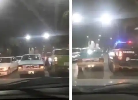 Insólito video en Laferrere: Sacó a pasear a dos nenas en el techo del auto, se cruzó dos patrulleros y no le dijeron nada