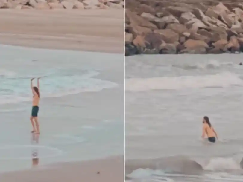 En medio de la ola polar, un hombre se metió al mar y se volvió viral en las redes