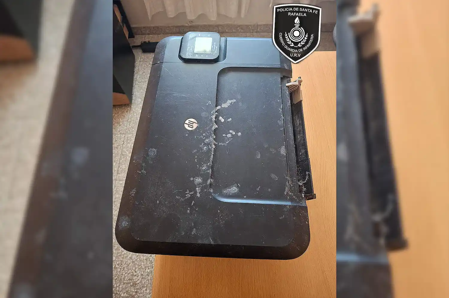 ¿Quién "perdió" una impresora?: encontraron una abandonada entre las plantas de una casa en Rafaela