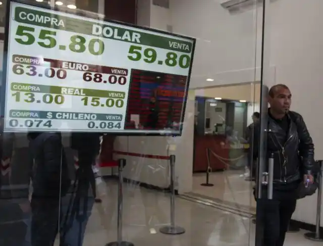 El dólar superó la barrera de los $59
