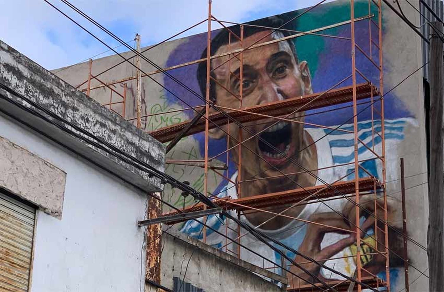 «De nuestros barrios al mundo»: el mural que tendrán Messi, Di María y Maxi Rodríguez en Rosario