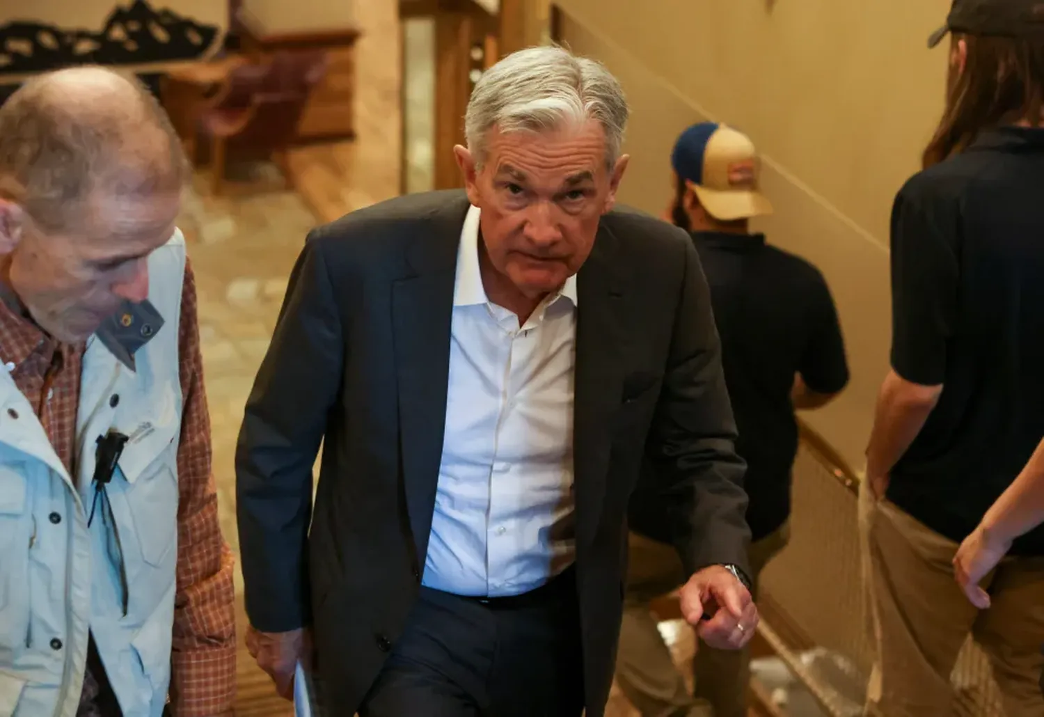 Jerome Powell, chair of the Federal Reserve, walks in Teton National Park