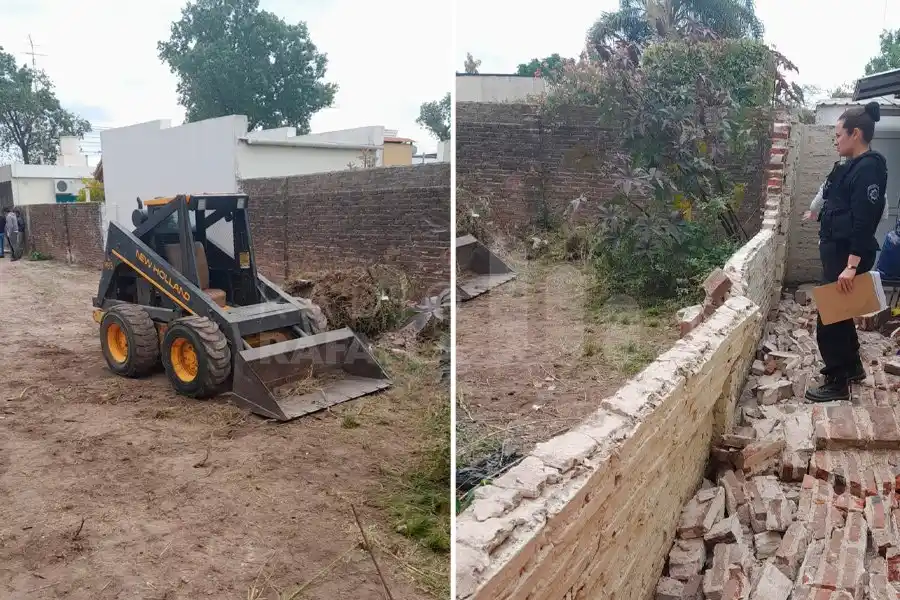 Gran susto: estaban limpiando un lote lindero y le tumbaron todo el tapial con una máquina