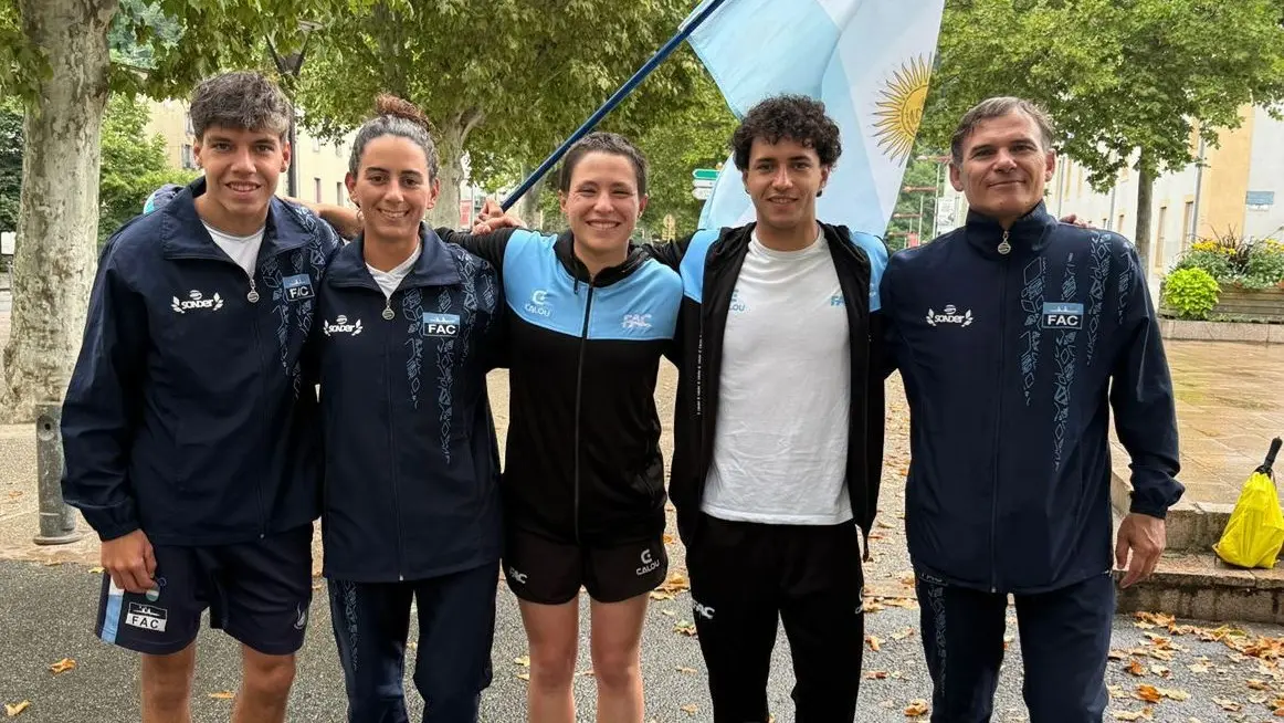 Castiglione y Trípano, con la delegación argentina en Francia