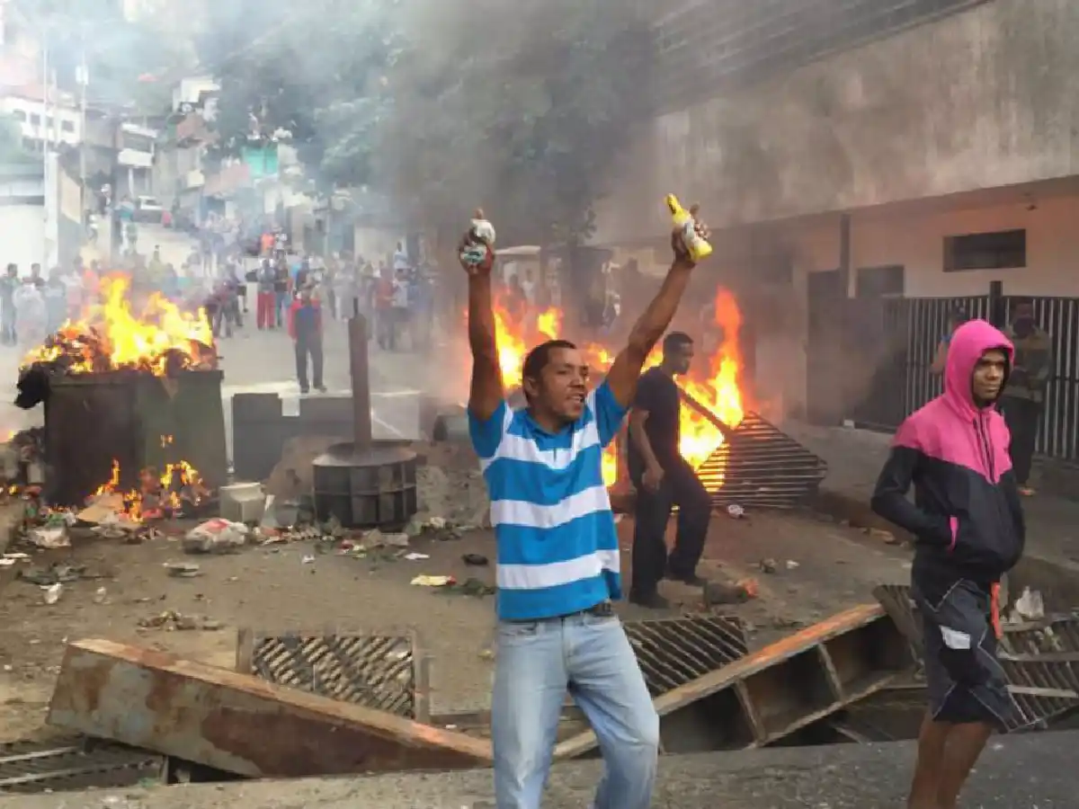 Suben a 26 los muertos por los disturbios en Venezuela