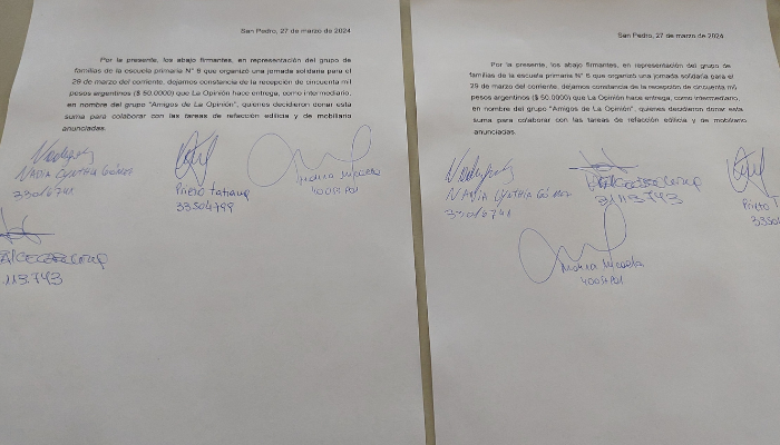 Documento firmado por los padres que recibieron el dinero.
