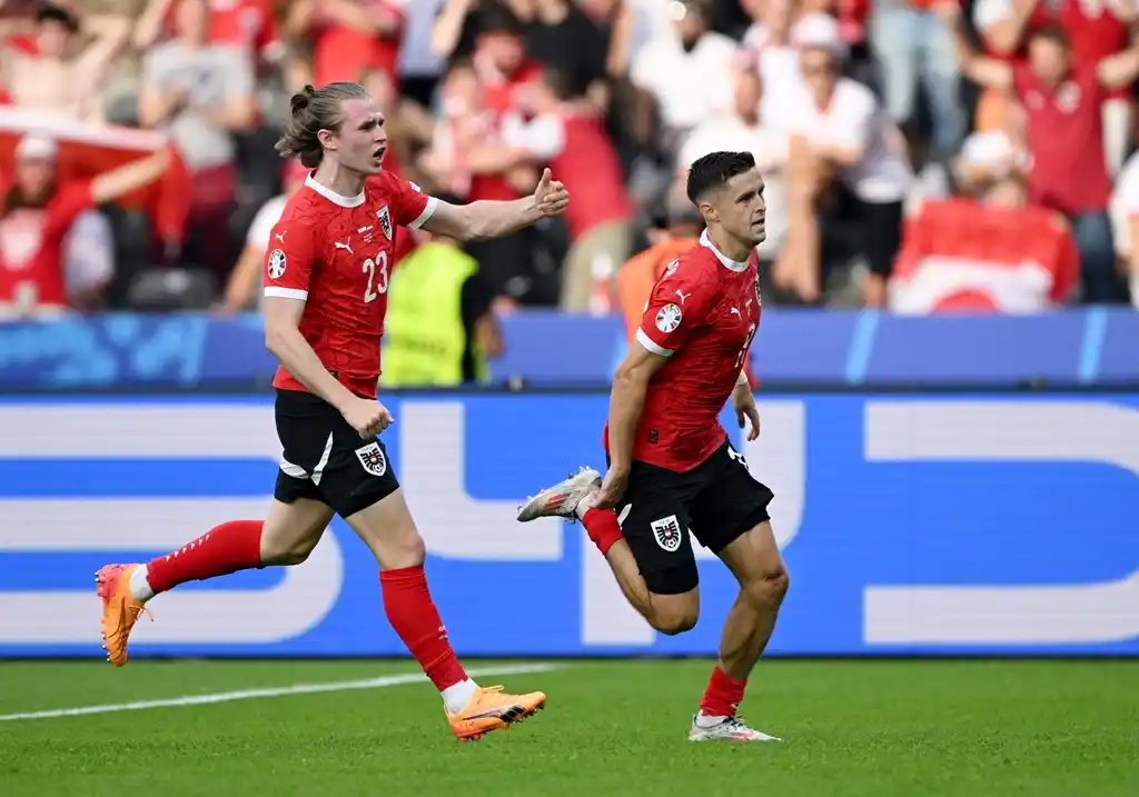 Baumgartner celebra el segundo gol de Austria.