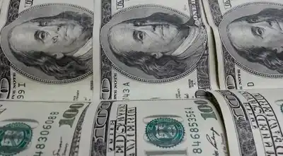 El dólar bajó por tercera jornada consecutiva y se ubicó en $1.460