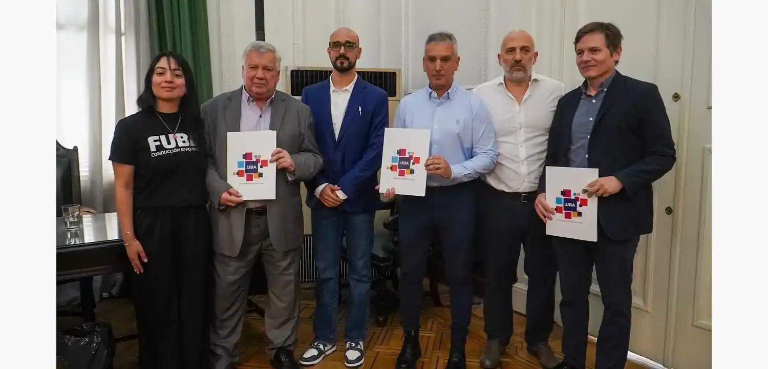 Abel Pintos firma convenio con la UBA