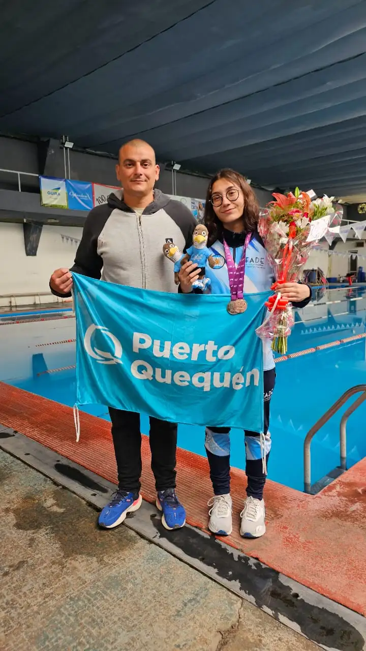 Guadalupe Angiolini junto a su entrenador Claudio Castagnari