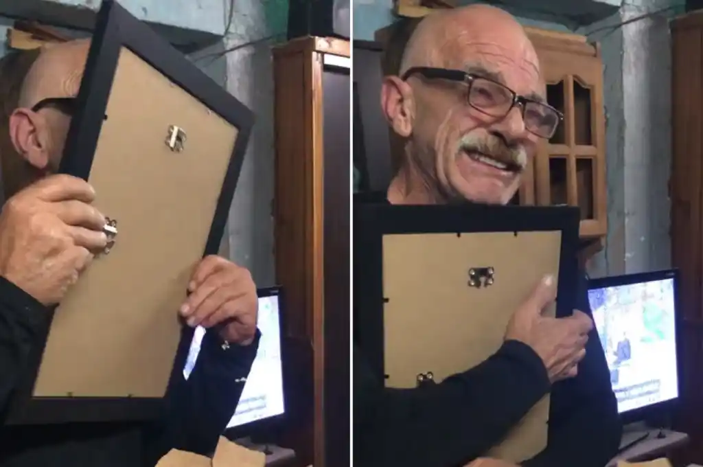 El abuelo se emocionó al ver la foto hecha con IA y le dio un beso al retrato. (Captura: TikTok/@solguerrerob)