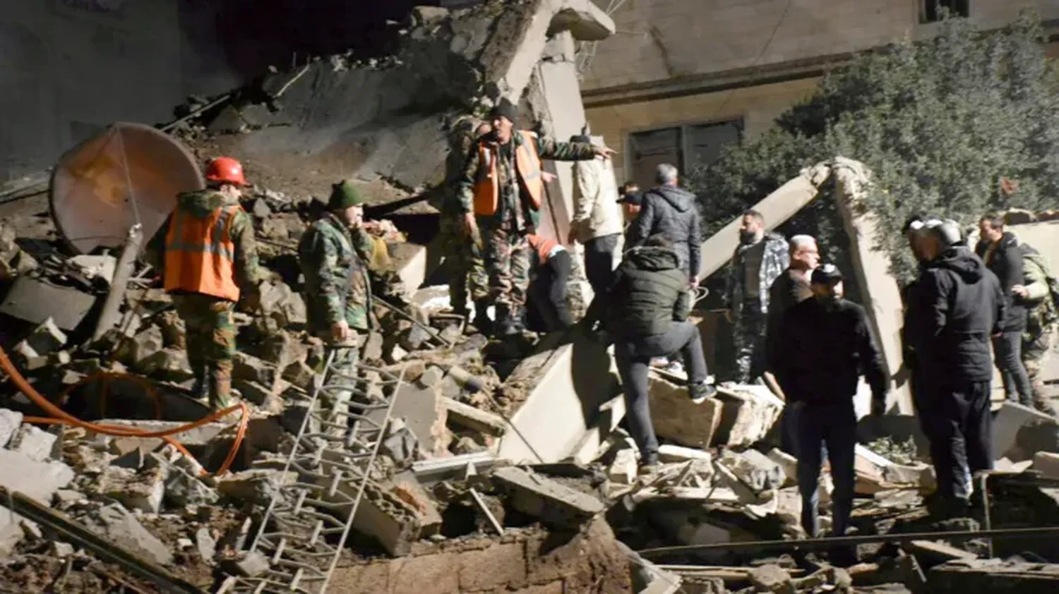 A damaged building following an air strike in Syria’s Deir Ezzor on March 26.