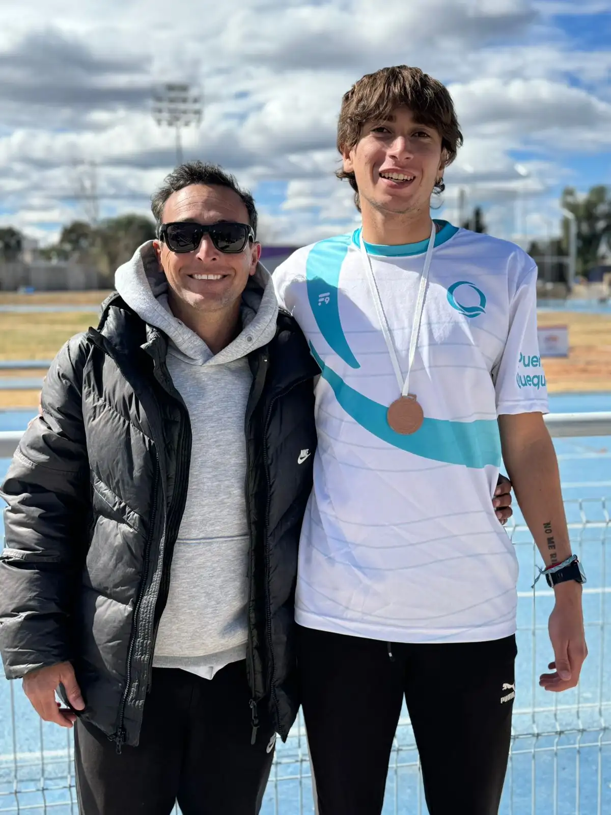 Santino Marchetti, junto a su entrenador Mauro Cabrera