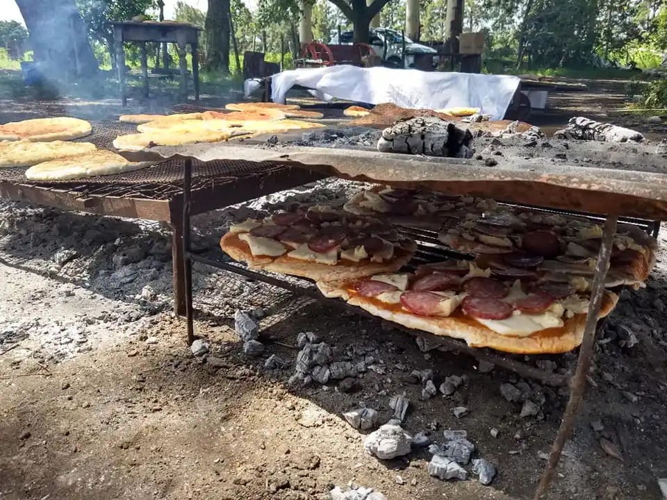 Concurso de preparación de pizzas a la parrilla