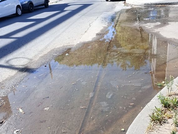 Charco en 14 de Julio y pasaje Azopardo