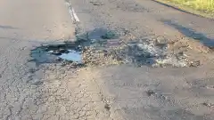Exigen al Municipio un bacheo urgente en la Ruta 80 y que gestione la repavimentación