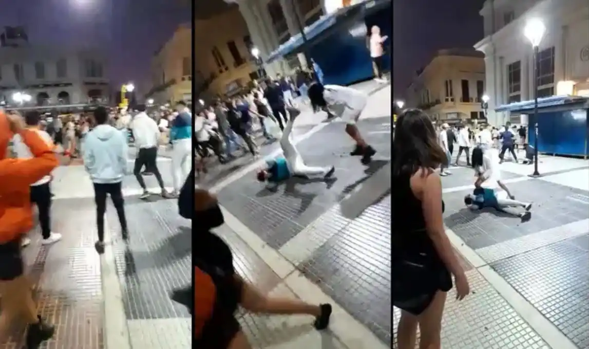 Le pegaron un botellazo en medio de una batalla campal en la peatonal de Paraná