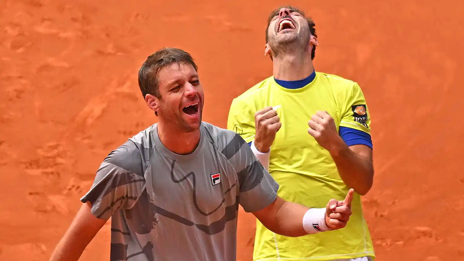 Horacio Zeballos y Marcel Granollers celebrando el número 1 del mundo.