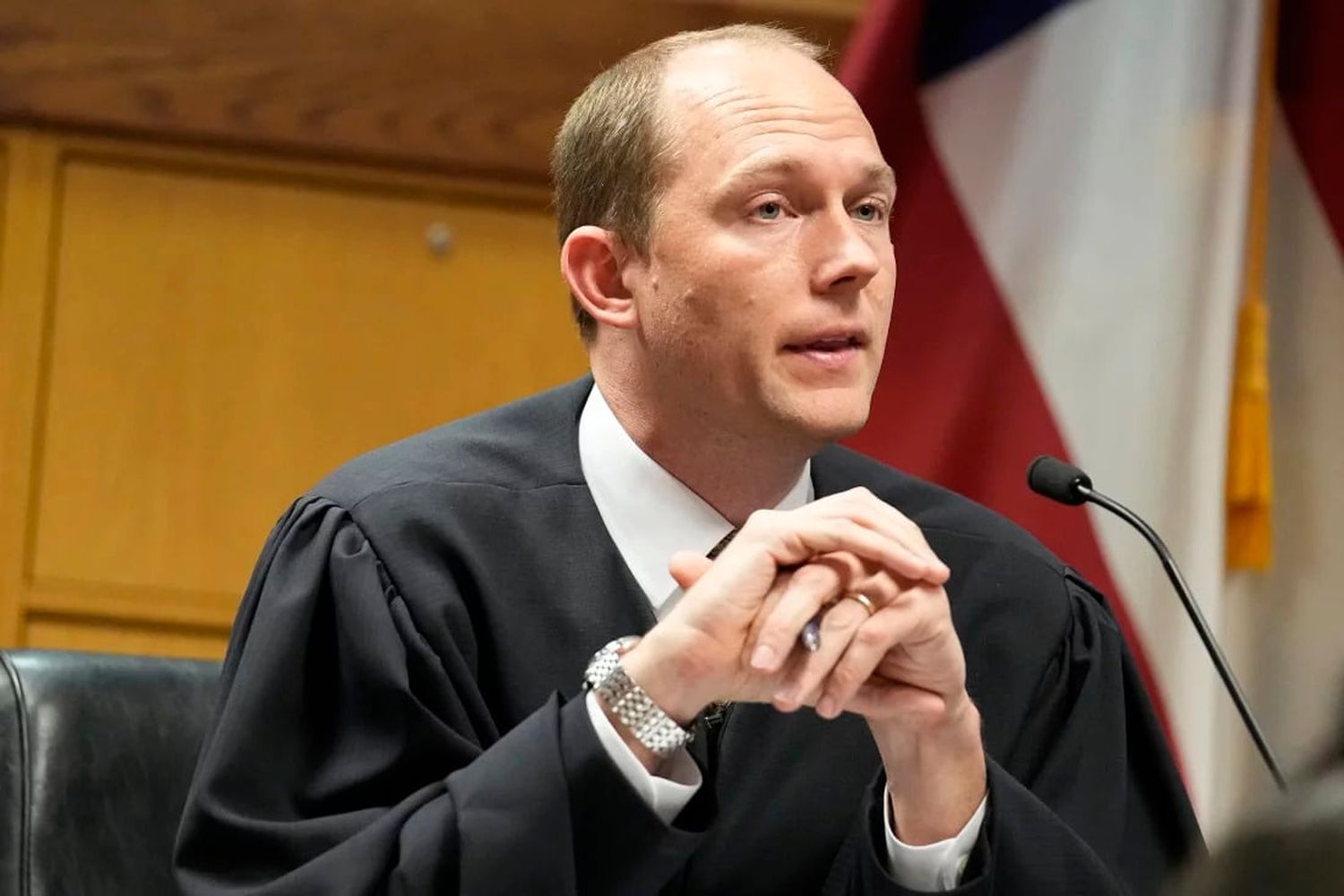 Fulton County Superior Judge Scott McAfee presides in court during a hearing in the Georgia election interference case.