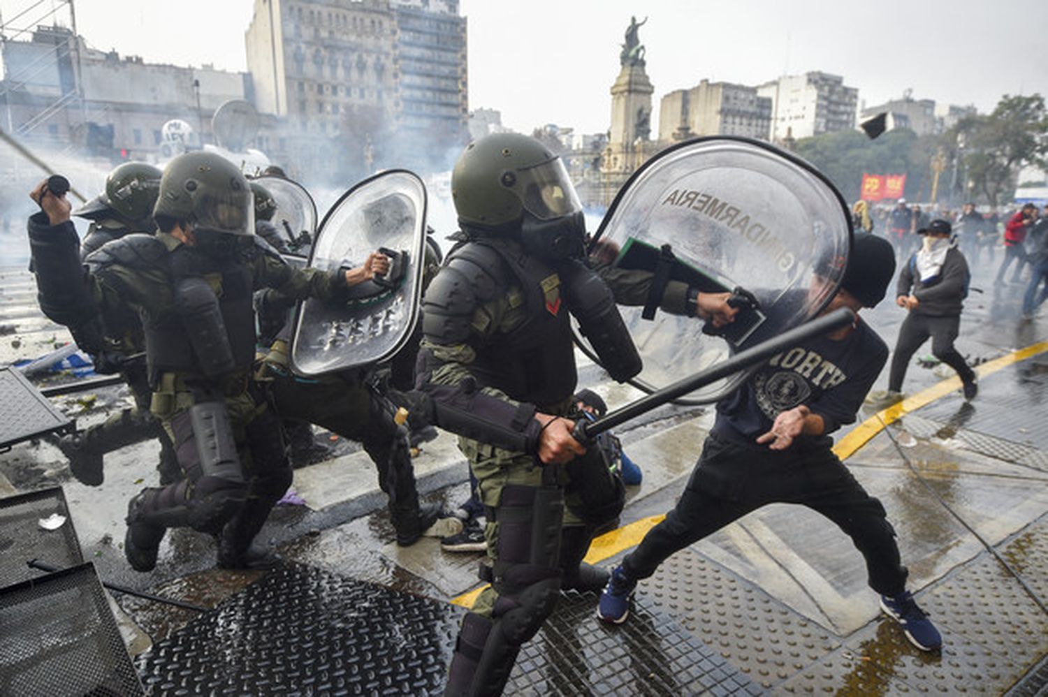 Anti-government protesters clash with police outside Congress in Buenos Aires, Argentina, on June 12, 2024.