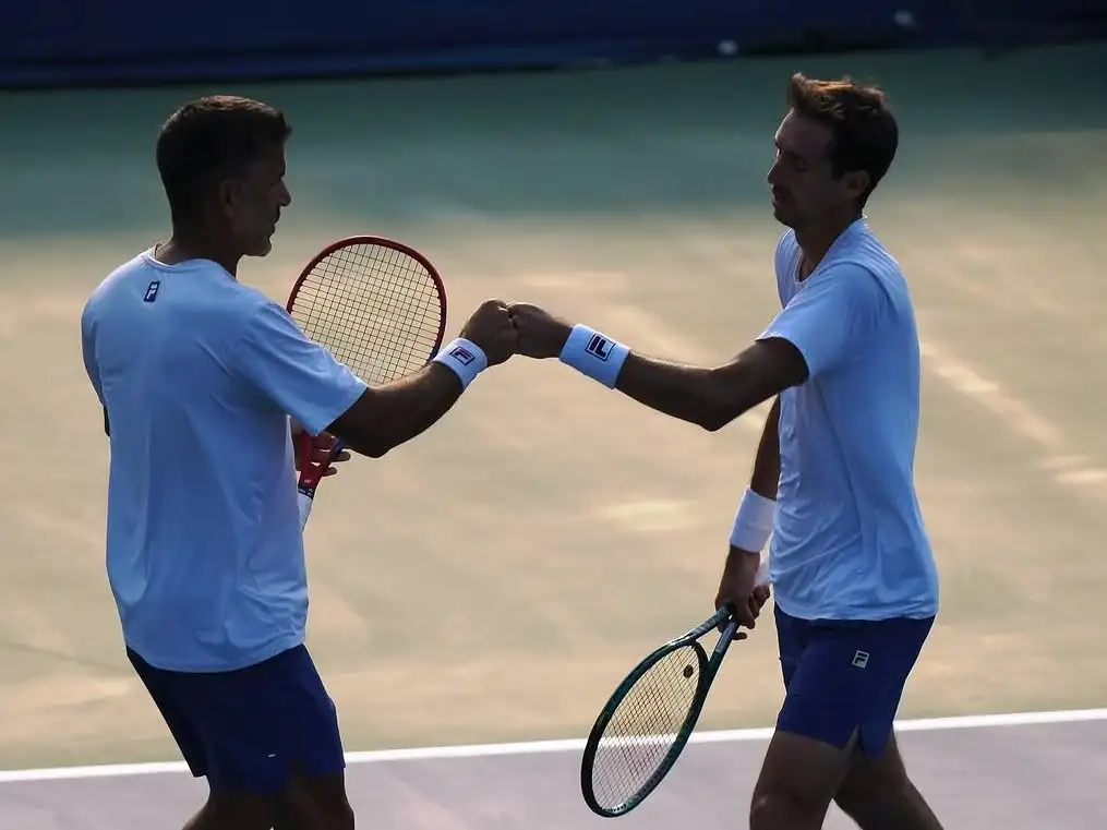 González y Molteni avanzan en Nueva York.