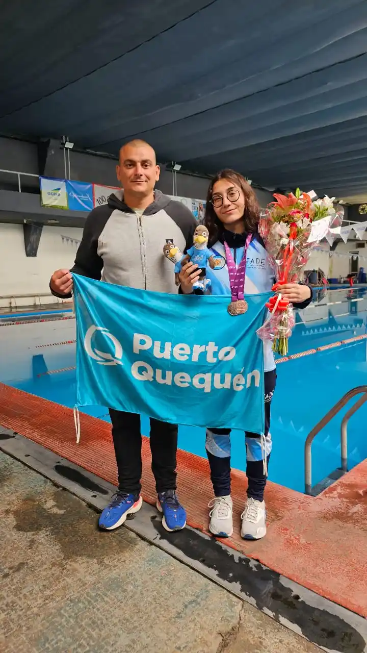 Guadalupe Angiolini junto a su entrenador Claudio Castagnari