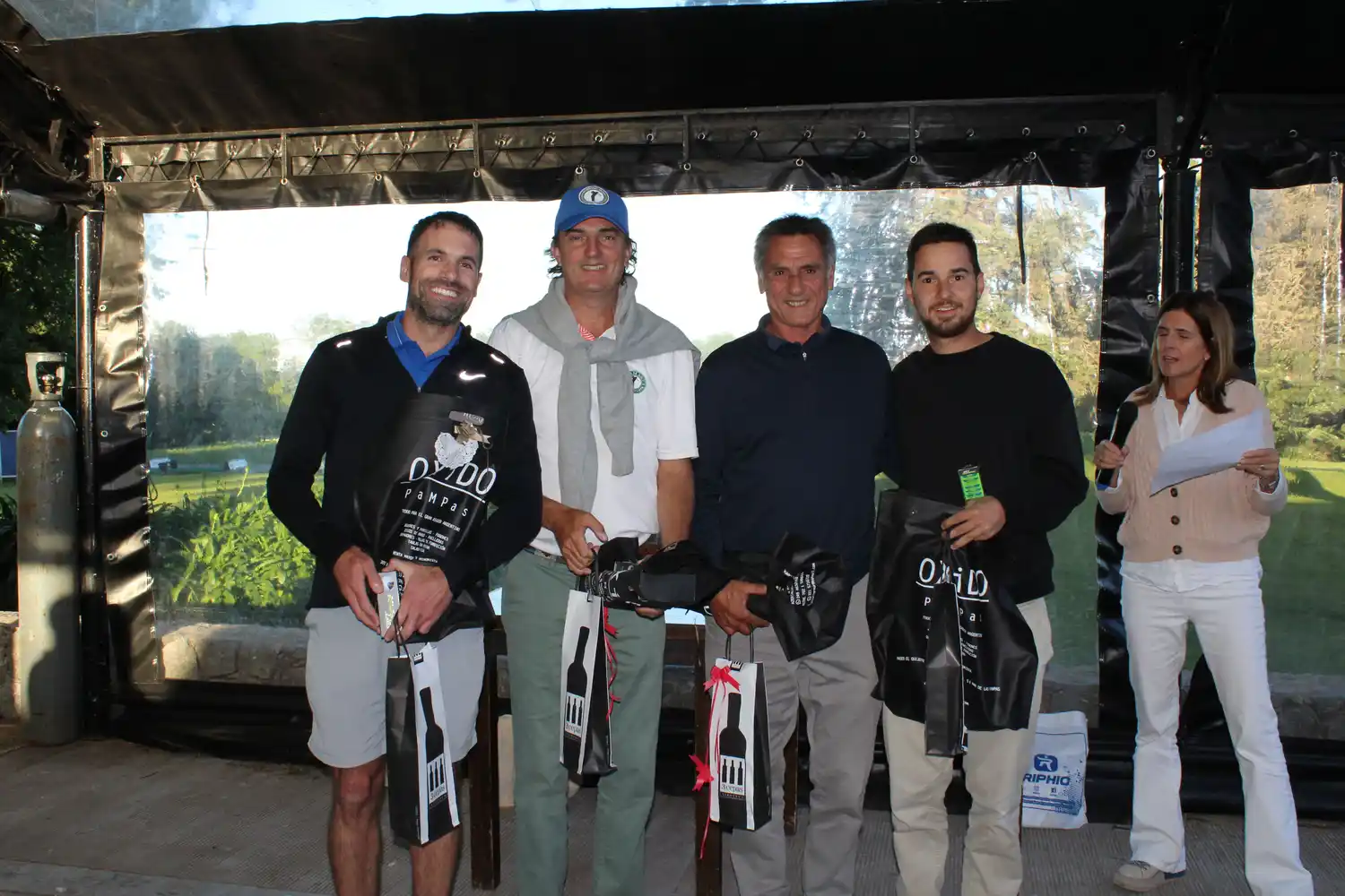 Rotonda, el organizador Goti, Esteban Carletti, Santiago Carletti y López Matta; en la premiación del torneo Interempresas.