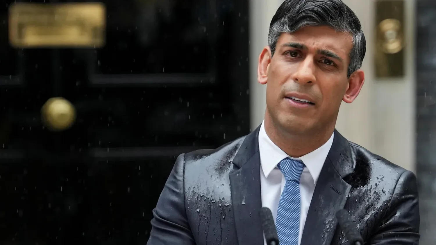 British Prime Minister Rishi Sunak delivers the soggy speech outside London's 10 Downing Street, on May 22