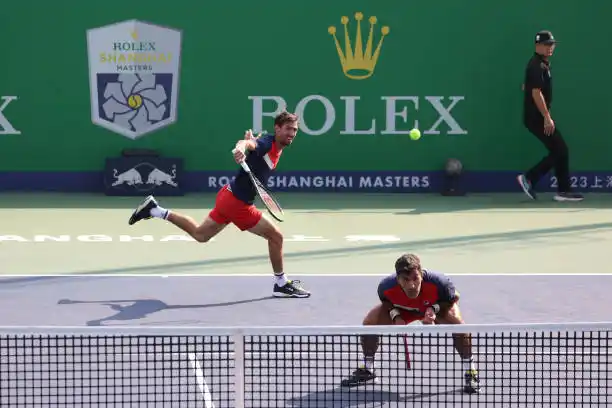 “Machi” y Molteni en acción ayer, en Shanghai.