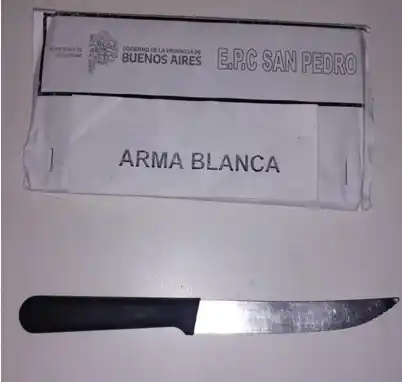 amenaza con cuchillo a su pareja - 1