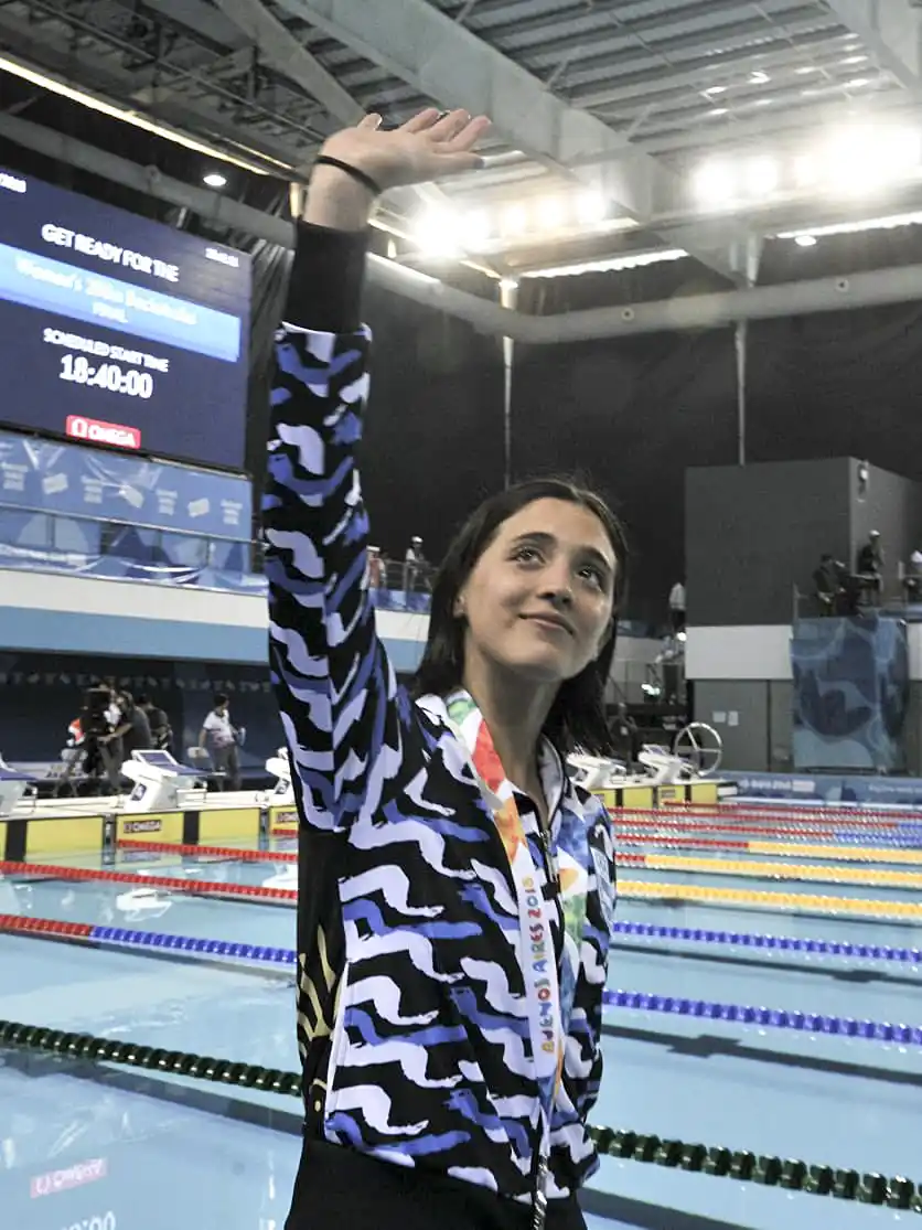 En natación y remo, las primeras medallas
