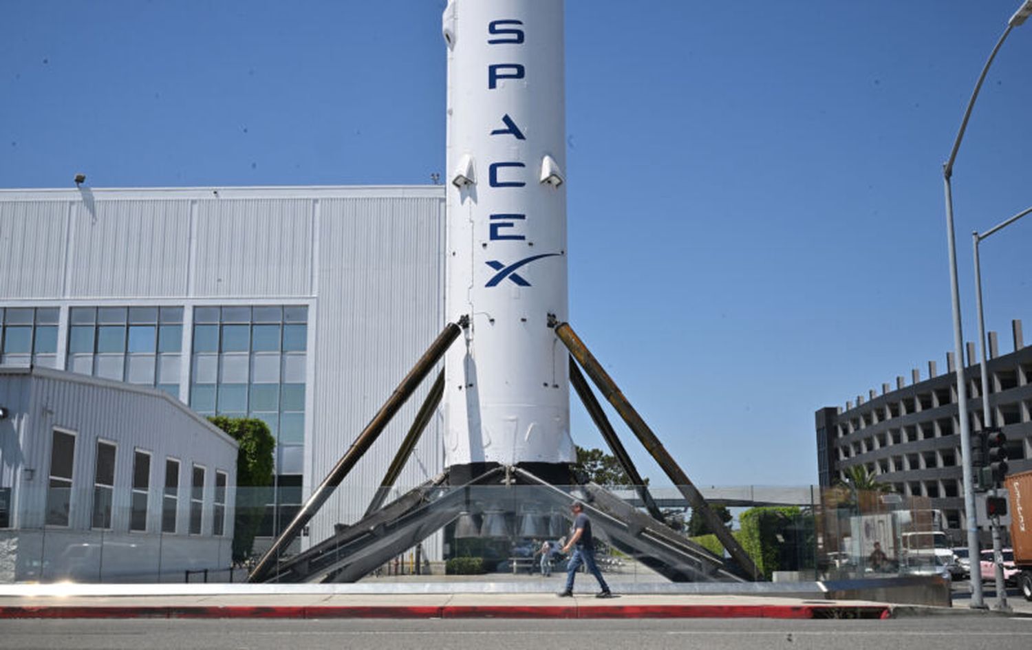 Elon Musk announces the relocation of SpaceX and X headquarters from California to Texas, citing new state laws.