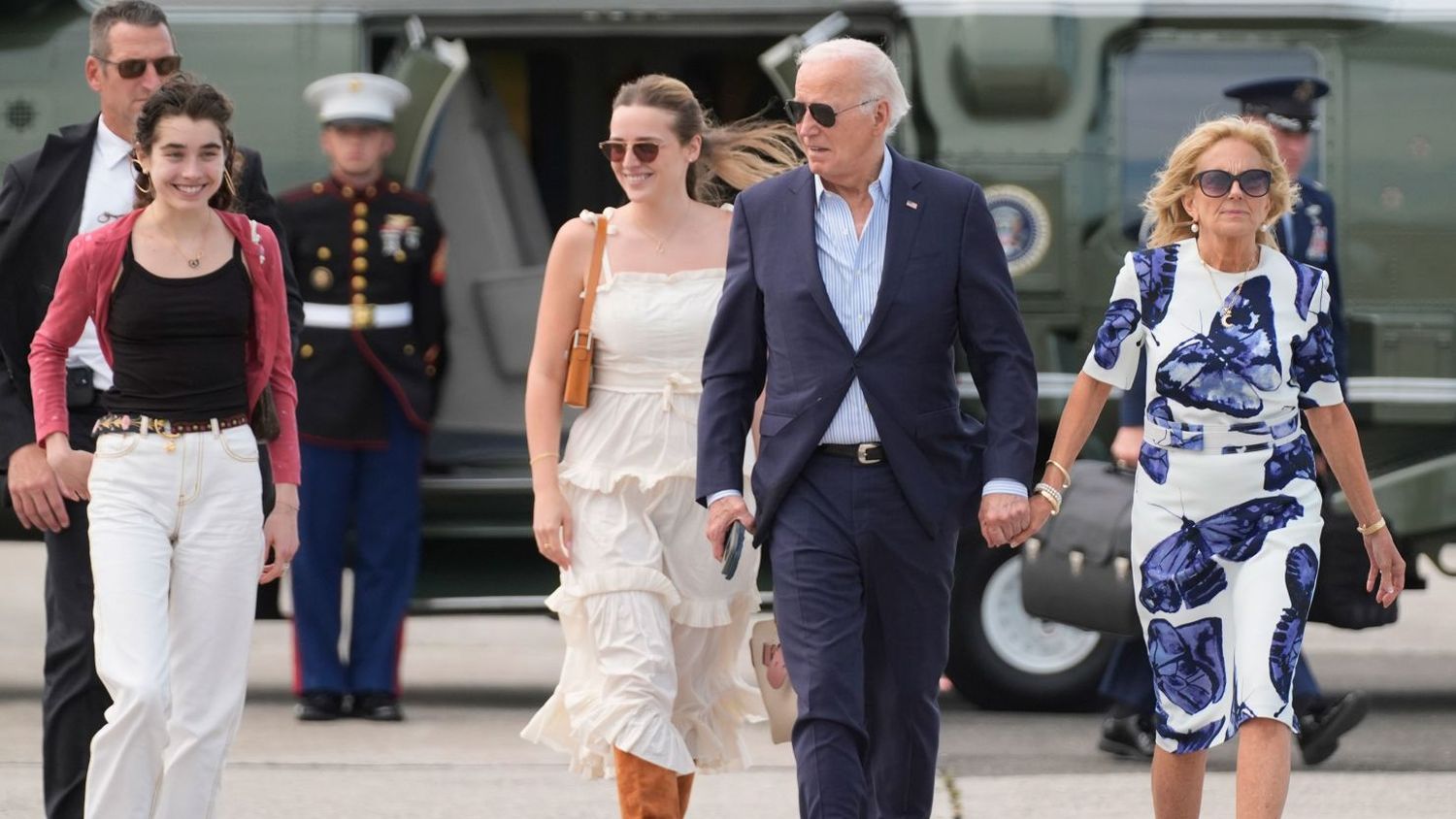 President Joe Biden and first lady Jill Biden and their granddaughters Natalie Biden, left, and Finnegan Biden arrive in East Hampton, New York, for a fundraiser Saturday.