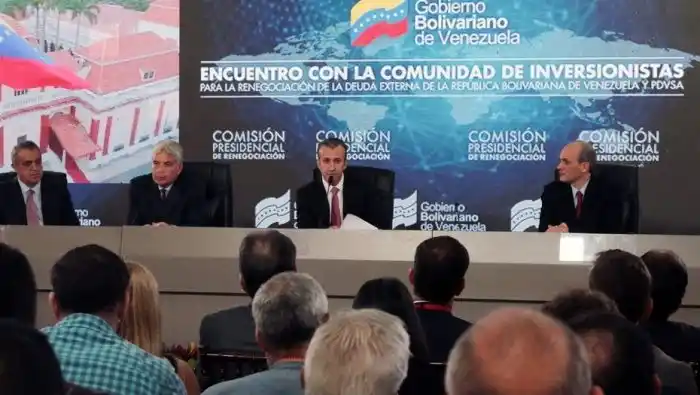 Venezuela entra en default parcial de su deuda