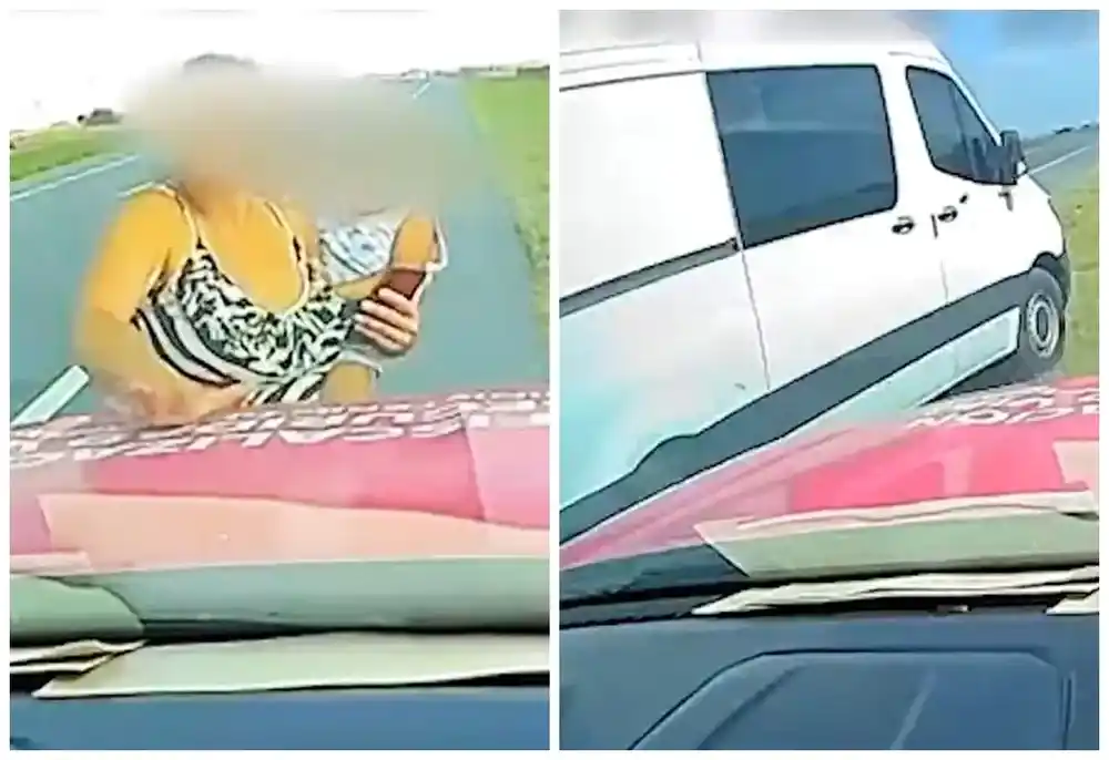 La mujer con el bebé en brazos agrediendo al móvil del Ministerio de Transporte y, luego, con su pareja en la camioneta intentando chocarlo. (Imagen de video)