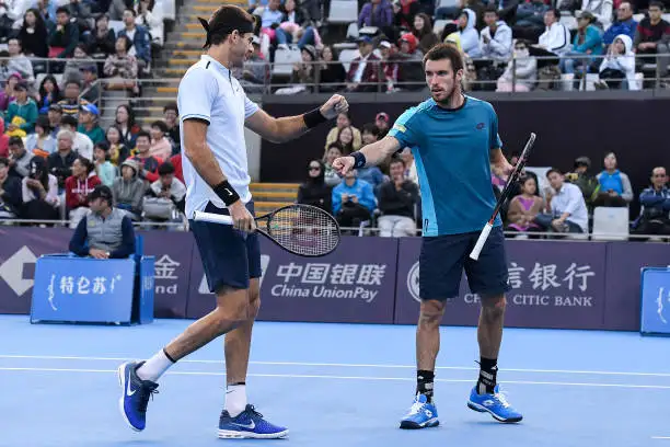Del Potro y Mayer jugando dobles, en el China Open 2017.