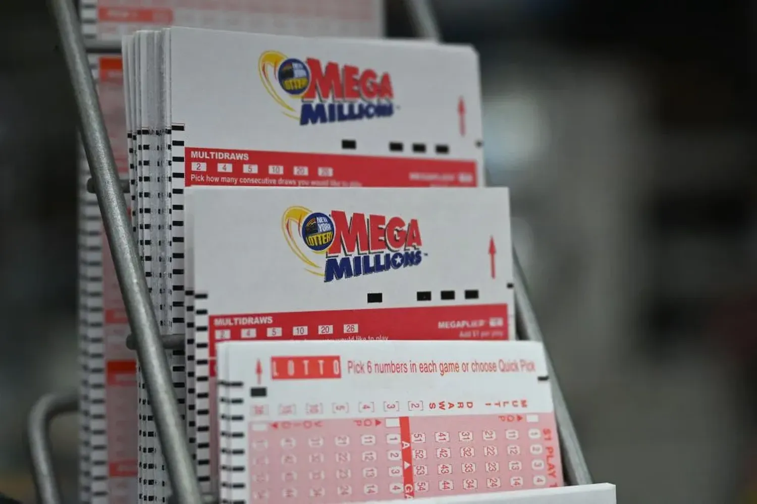 Mega Millions lottery tickets are seen in a store in New York