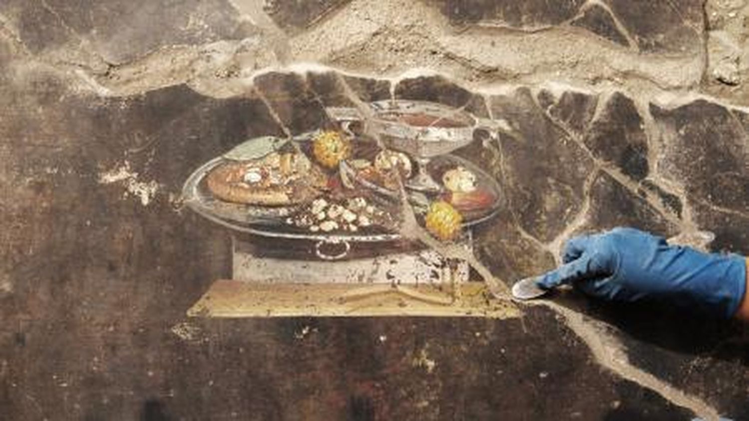 Hallan una pintura de 2.000 años que tendría a una pizza dibujada entre sus elementos
