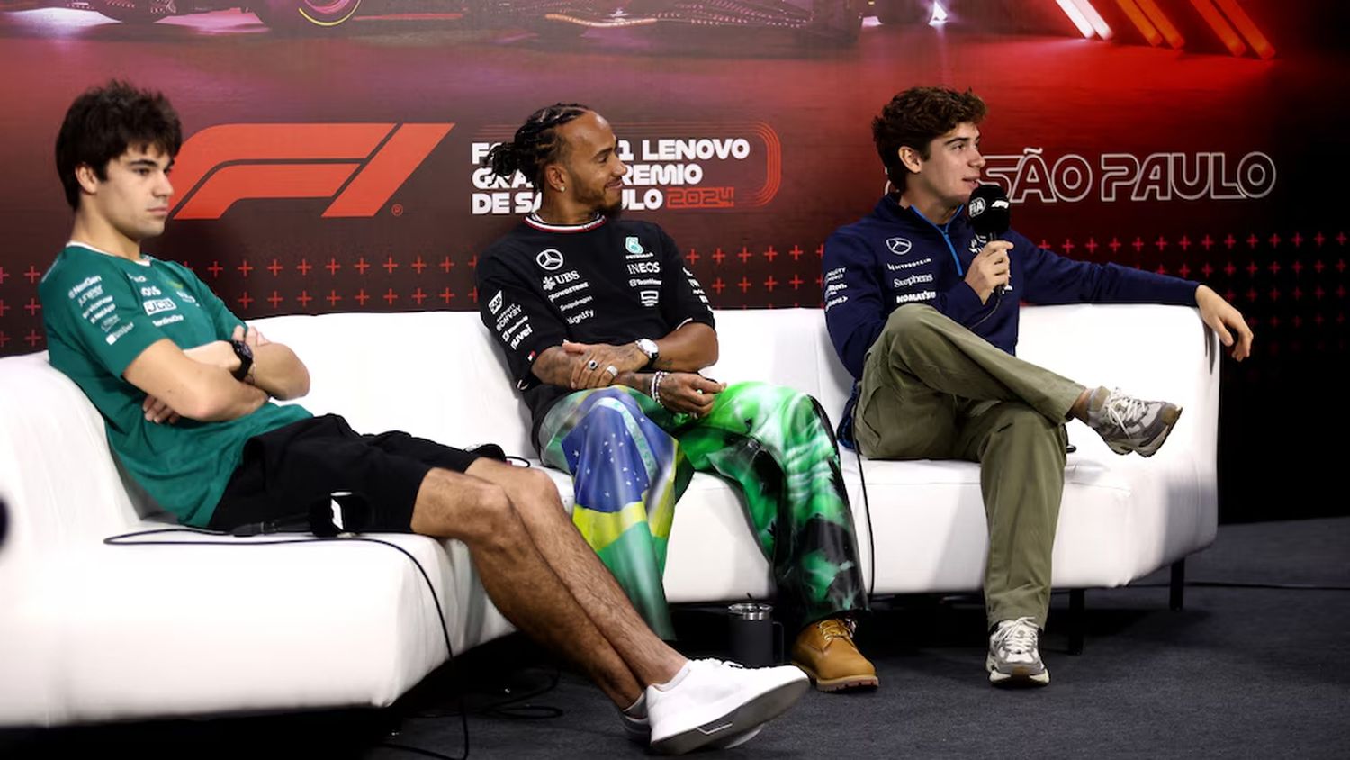 Lance Stroll, Lewis Hamilton y Franco Colapinto