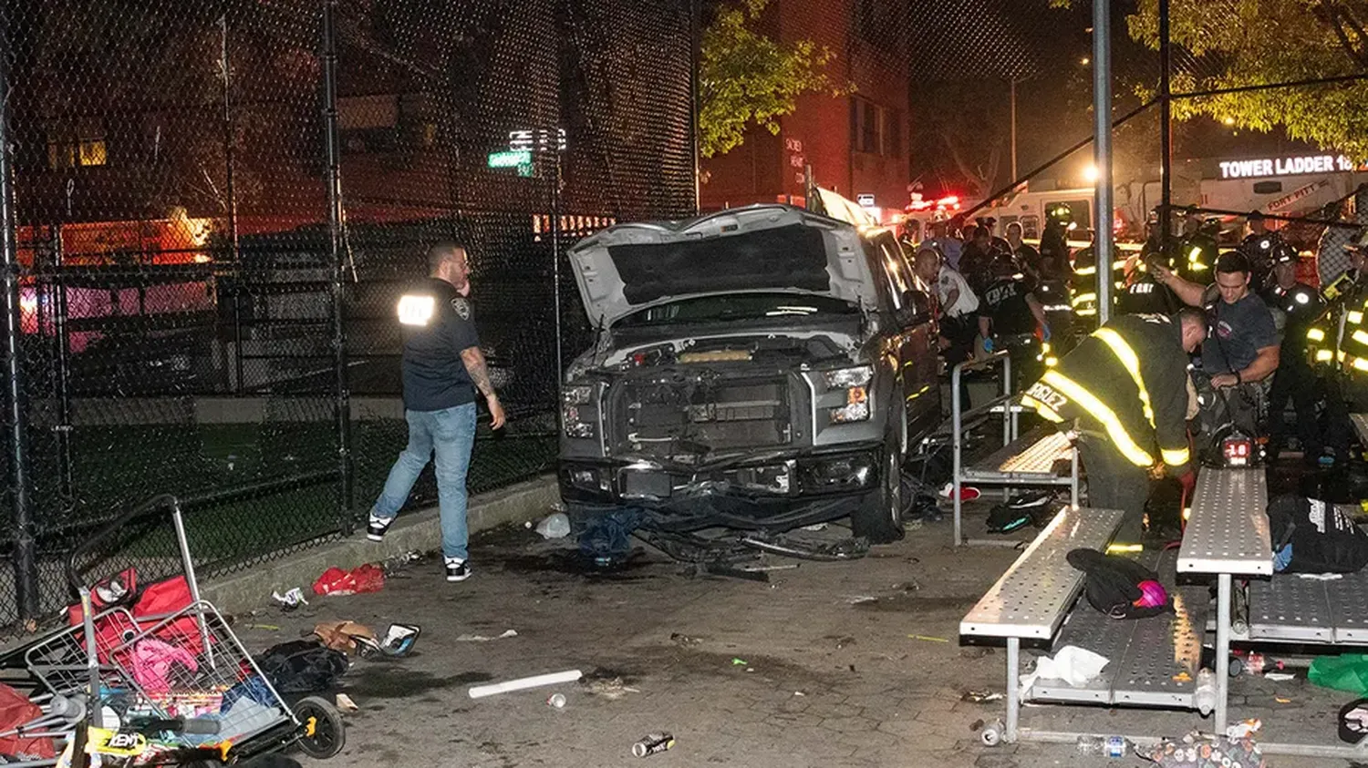 Firefighters and police respond after multiple people were struck by a pickup truck inside Corlears Hook Park in Manhattan, New York City on Thursday, July 4 2024