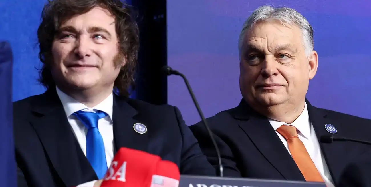 Javier Milei junto a Viktor Orban en la primera reunión del Consejo de Paz de Trump. Crédito: REUTERS/Kevin Lamarque