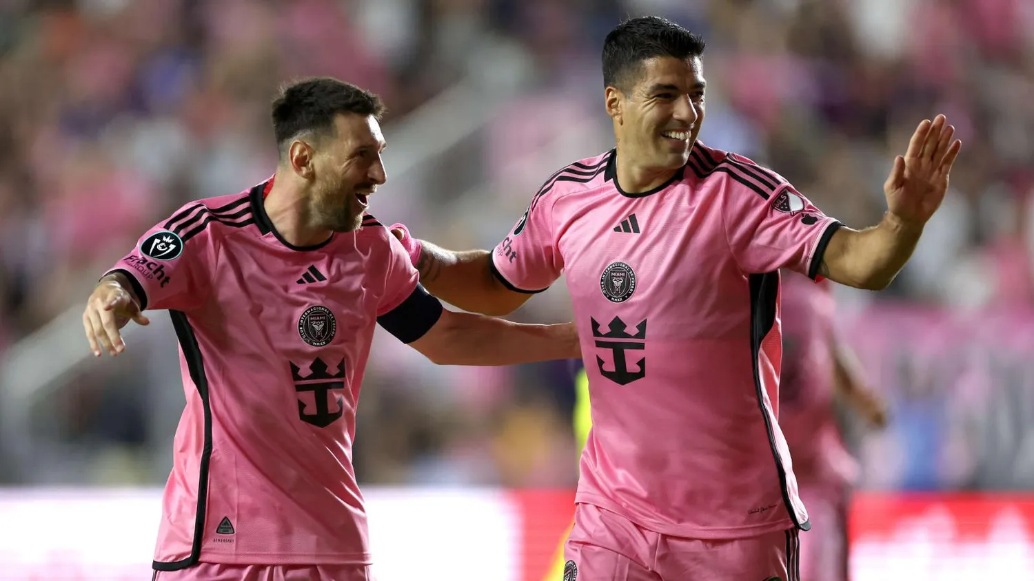 Messi and Suárez celebrate a goal, showcasing their legendary partnership at Inter Miami.