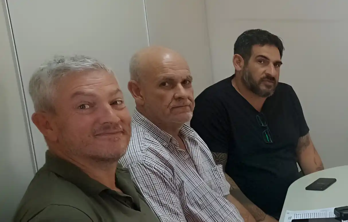 Daniel Porta, junto a Borgo y Baraybar, en una reunión en el Ministerio de Trabajo por el conflicto con Cicop.