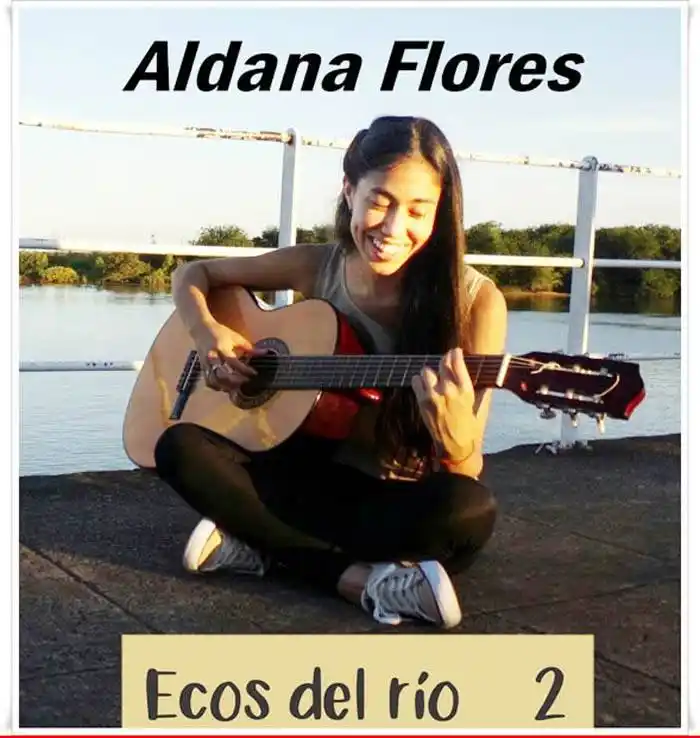UNA  JOVEN   GUITARRISTA,  DE  M�0DANOS 