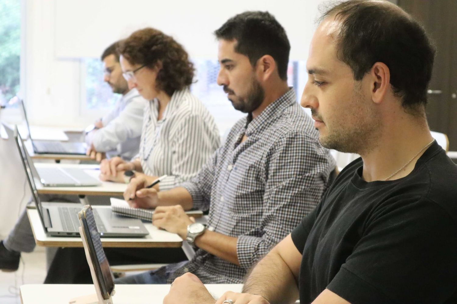 Juan Pablo Solis y Guillermo Denoni, en primera plana.